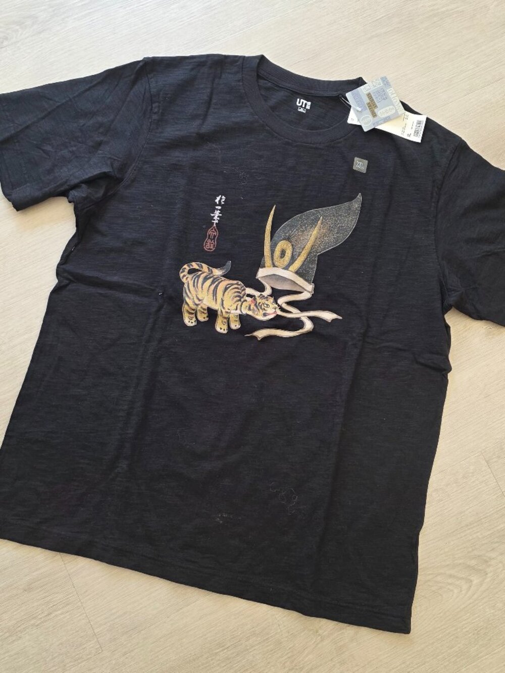 New UNIQLO men's black short sleeves tee